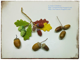 An oak twig with acorns out of seed beads