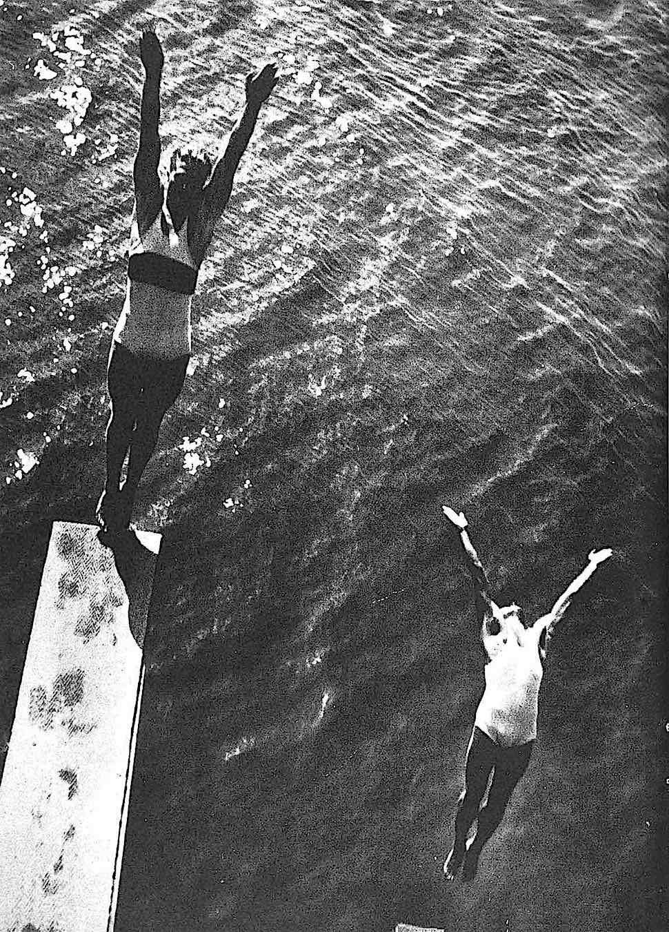 1932 diving, a birdseye view photograph of two divers