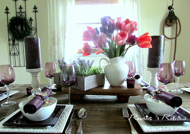 spring tablescape with white and purple dishes