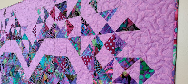 Exploding Heart quilt in Kaffe Fassett fabrics from the Emperor collection