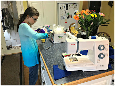 April 8, 2019 Being treated to homemade sugar cookies while I sew.