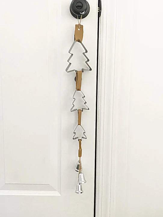 cookie cutter bells on front door knob