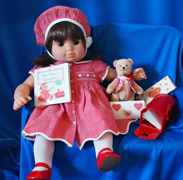 Bitty Baby Twin Dressed in a Valentine's Day outfit.