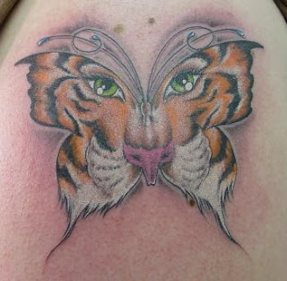 face butterfly tiger tattoo