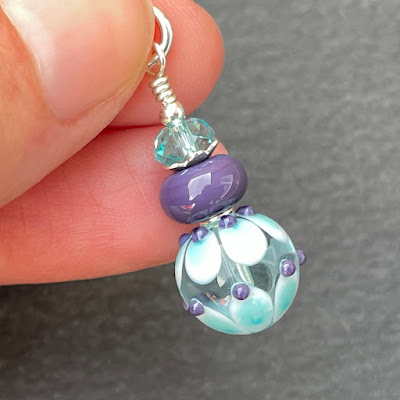 Pendant made with a handmade lampwork glass headpin by Laura Sparling