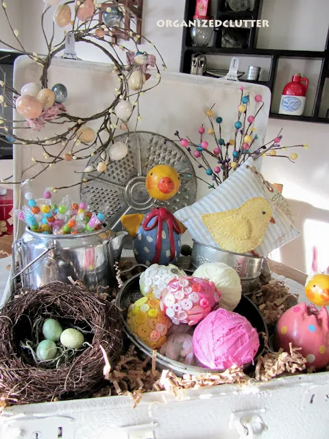 Photo of an Easter suitcase vignette.