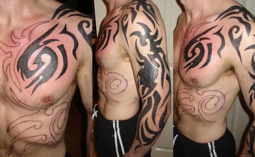 tribal chest tattoo. mens tribal tattoos. tribal