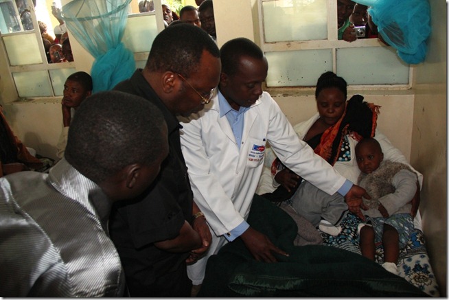 Mbowe consoles patient at Mt Meru hospital