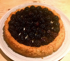 Pear and blackberry sponge flan with elderflower, gin and tonic jelly