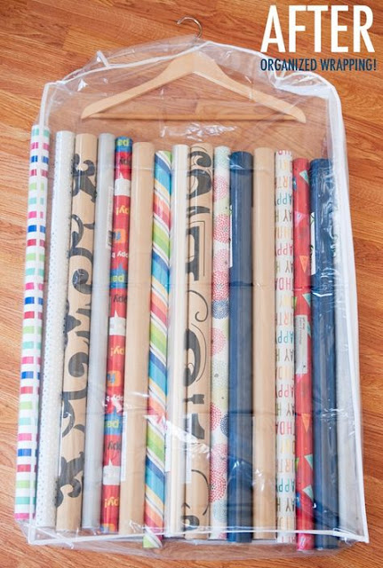 Organize  wrapping paper in a clear garment bag