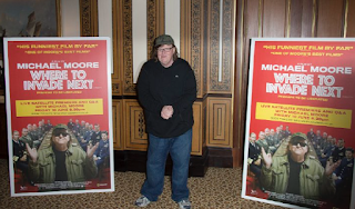 Michael Moore: Ban Guns, Retrain All Cops, End War 