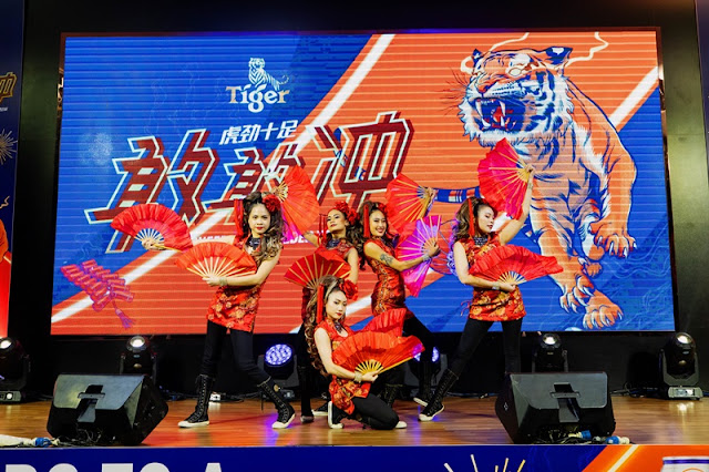 A performance by ENAJ Productions at the Tiger CNY 2024 media launch at Sunway Velocity Mall KL