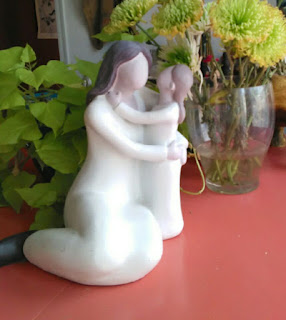 http://www.bonanza.com/listings/Mother-and-Child-Statue/428510511