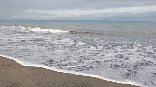 the beach and the sea at Red Beach, Baras, Palo Leyte