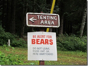 The resident black bear walked across our path as we were driving through Hyder, just before we came across this sign.  We are warned not to surprise a bear.  Many hikers wear bells to warn them humans are in the area.  And also, it is good to detour around areas where you see or smell carcasses of fish or animals.  That may be the bear's food stash and it may defend it aggressively.  Although most of the time the bear will avoid human contact.