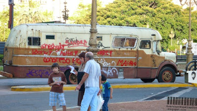 Argentine Bus Protester covered in tags