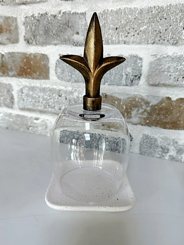 finial and glass with square drink coaster base