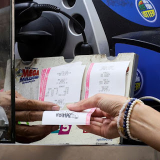 CEO purchases 50,000 lottery tickets with the intention of splitting any winnings with his staff.