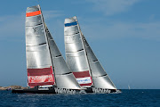 Emirates Team New Zealand racing against Synergy on Day 5 off La Maddalena. (cc )