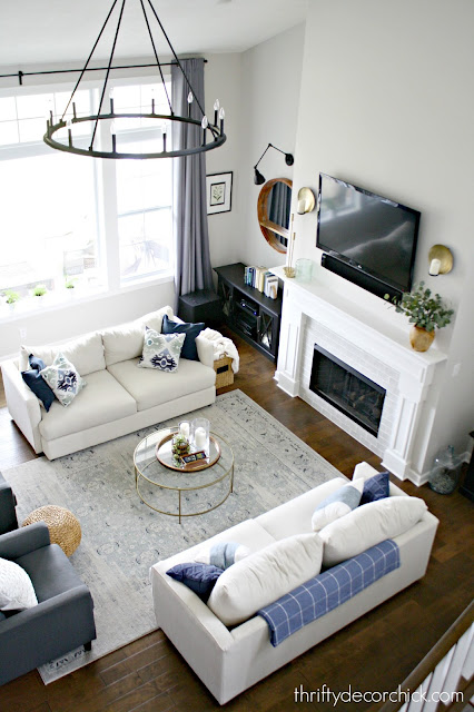 Symmetrical great room layout with two sofas