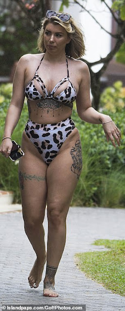 Olivia Buckland flaunts in a leopard print bikini in Barbados