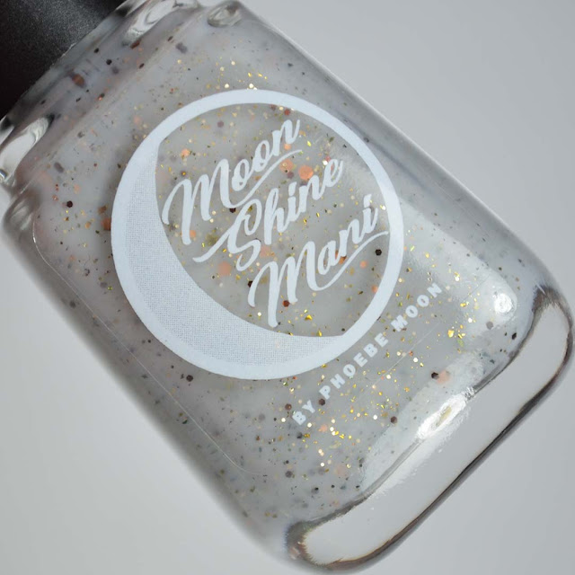 grey glitter nail polish in a bottle