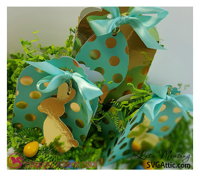 This is a picture of turquoise and gold treat bags with gold easter bunnies created by Lisa Mensing