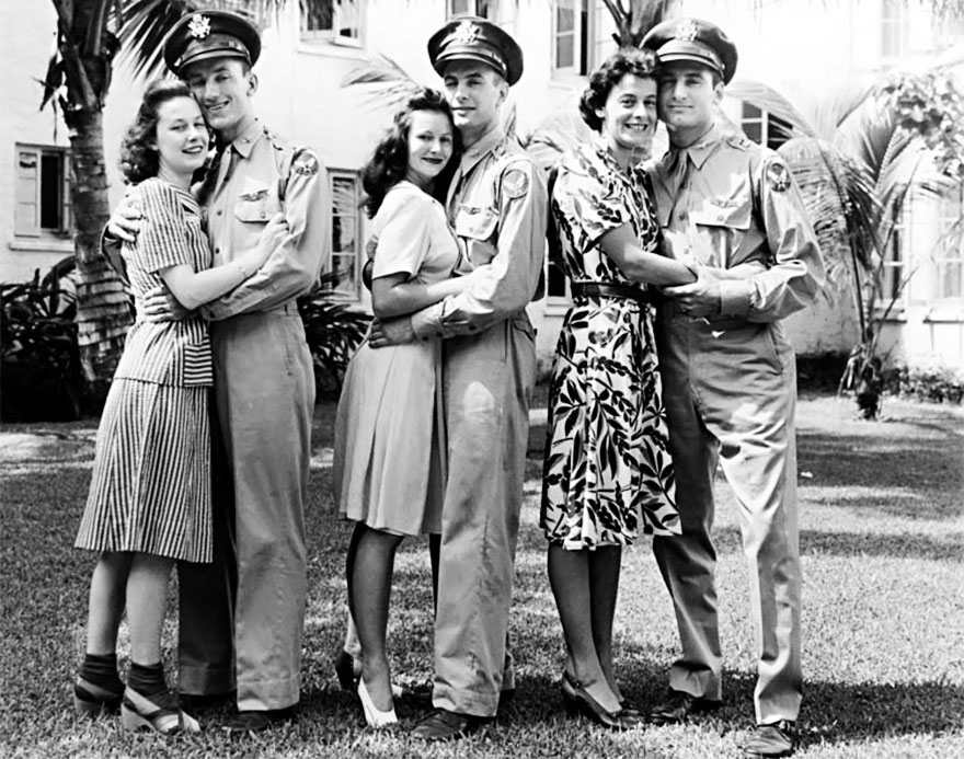 60 + 1 Heart-Warming Historical Pictures That Illustrate Love During War - Three Lovely Ladies Embrace Their Military Beaus, 1940s