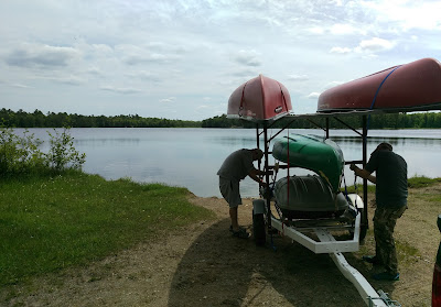 Unloading our custom made canoe trailer