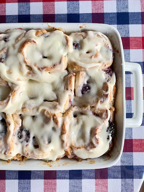 Fast Rise Blackberry Sweet Rolls, a soft, tender dough swirled with a mixture of vanilla brown sugar and butter and a generous layer of luscious, whole blackberries all throughout and topped with a cream cheese frosting.