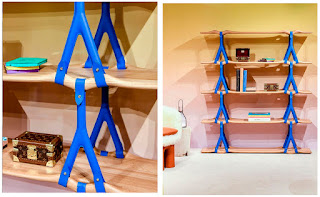 shelf suspended on blue straps