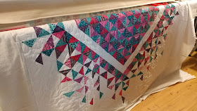 Heart quilt with quarter square triangles