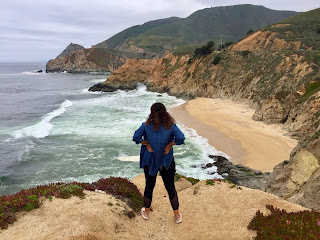 Sam standing on the edge of cliffs in California