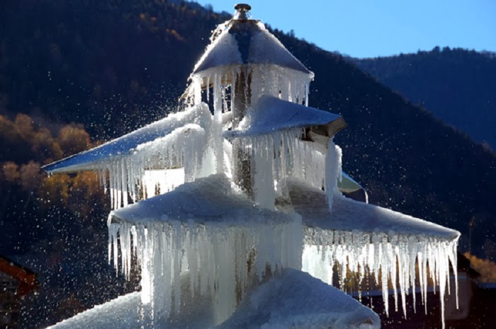 Saint-Lary, France - Winter Blast Transforms Water Fountains Into Magical Ice Sculptures