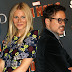 Gwyneth Paltrow y Robert Downey Jr en la premiere de Iron Man 3 en París