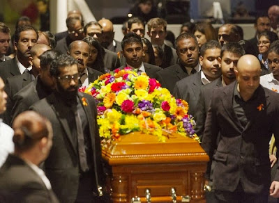 Myuran Sukumaran's coffin enters the service. Photo: James Brickwood