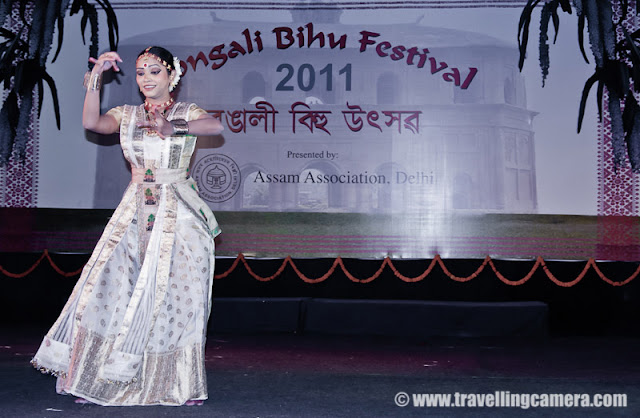 Sattriya Dance Performance during Rongali Bihu Festival @ Indira Gandhi national Center of Arts (organized by Assam Association, Delhi on 24th April 2011) : Posted by VJ SHARMA on www.travellingcamera.com : Sattriya Dance performances is one of the main highlight of Rogali Bihu Festival at IGNCA, Delhi ! And this performance was full of expressions and it seems these songs were telling some story which dancer was enacting through her steps !!!  Let's have a look at some of the photographs from Sattriya performance on 24th April, 2011 with relevant information about this particular form of Indian Classical Dance !!!Sattriya Nritya is one among eight principal classical Indian dance traditions. Whereas some of the other traditions have been revived in the recent past, Sattriya has remained a living tradition since its creation by the Assamese Vaishnav saint Srimanta Sankardeva, in 15th century AssamSankardeva created Sattriya Nritya as an accompaniment to the Ankiya Naat (a form of Assamese one-act plays devisdby him), which were usually performed in the sattras, as Assam's monasteries are called. As the tradition developed and grew within the sattras, the dance form came to be called Sattriya Nritya.The name 'Sattriya' has been derived from the word 'Sattra' which are religious Institutes set up by the Vishnava Saint Shrimanta Shankardev for preserving and propagation of tradition, culture and religion. It was coined centuries after and represents all that the Saint had created, which brought about a Socio-cultural Renaissance in the Assam Valley of INDIA !!!The Sattra style was evolved when Shankaradeva, a great artist and musician in himself composed 'Ankiya Bhaona' or 'Ankiya-Nat' (dance-dramas), devotional music- 'Borgeet', and the four sacred texts - “Kirtan', 'Dasam' 'Ghosa', 'Ratnavali' (the last two composed by Madhavdev). A School of Philosophical Learning emerged and a deeper understanding of life through the simple path of devotion brought one and all to the fold...Actually Sattriya dance of Assam is aclassical form of dance which is highly devotional in character with the spiritual aspect being predominant all through !!!This Dance form of Sattriya is like many of the other Classical Dance forms of India which has been extracted from a larger body of theatrical practices that constitute the Ankiya Bhaona form. References of this dance form can be found in the ancient Indian classical texts like the Natyashastra, the Kalikapurana, the Yoginitantra, and the Abhinayadarpana apart from many sculptures, and historical relicsThe musical Instruments that accompany a performance are the khols or the drums, the taals or the cymbals, the flute and the violin. Even though Sattriya dance is performed by bhokots or the male monks traditionally in monasteries...The popular forms of the Sattriya dance are Apsara Nritya, Behar Nritya, Chali Nritya, Dasavatara Nritya, Gosai Prabesh,  Nadu Bhangi, Manchok Nritya, Bar prabesha, Gopi Pravesha, Rasa Nritya, Rajaghariya Chali Nritya, and Sutradhara.While I was searching throuh all relevant information about this particular form of Indian Classical dance, I found a link where I saw the same artis.. Please have a look and she really looks the same. Isn't it? - http://www.mridusattriya.com/satt_dance.htmlThe Sattriya dance can be classified into two styles namely Paurashik Bhangi that is Tandav or masculine style and Shtri bhangi which is Lasya or feminine style !!!This was one of the interesting performance of the evening at Rogali Bihu Festival although colorful lighting spoiled my lot of photographs... I will be sharing some colorful shots of Sattriya Dance soon !!!Now I know another Indian Classical Dance form and loved the expressions of performer here !!!