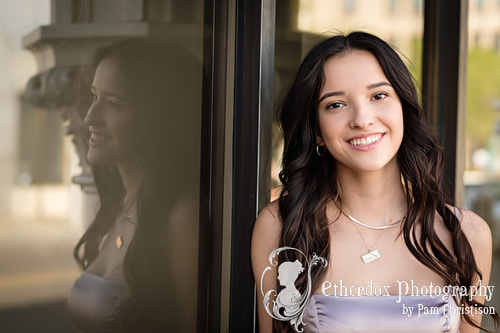 Professional photo of a beautiful high school senior girl in Albuquerque Early College Academy