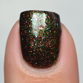 black nail polish with halloween micro glitter