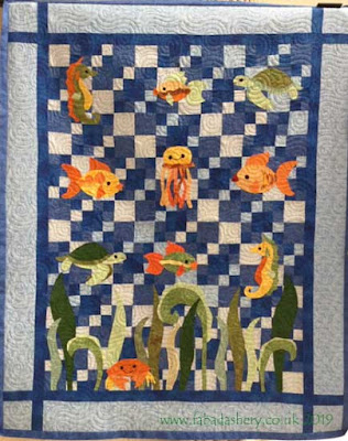 Underwater creatures quilt made by Valerie, quilted by Fabadashery Longarm Quilting