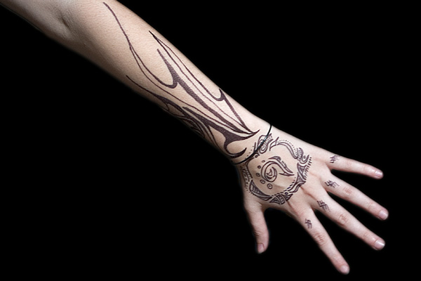 Unique Tribal Tattoo Ideas on Arm