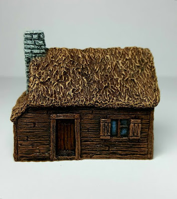 Thatched Timber-clad Cottage