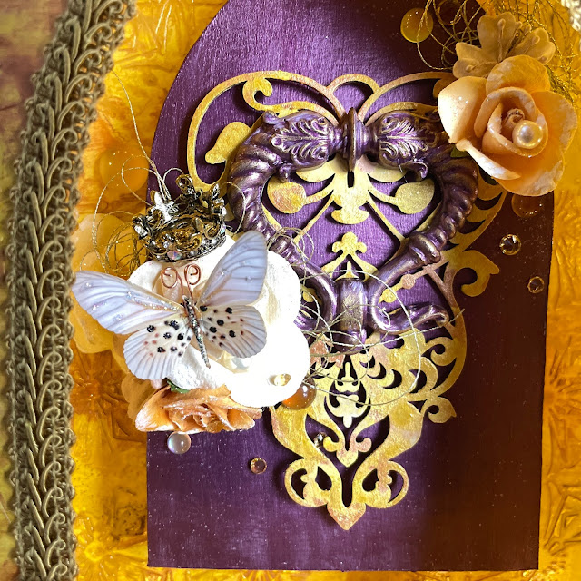 Golden Shrine made with Prima flowers, chipboard, melange, paint, memory hardware; Reneabouquets butterfly; Tim Holtz tiny lights and Pinkfresh crystals