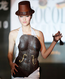 model wearing chocolate breastplate