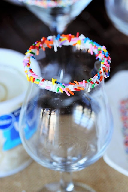 Cocktail Glass with Rainbow Sprinkles Rim Image