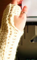 http://www.ravelry.com/patterns/library/chunky-ribbed-fingerless-mitts