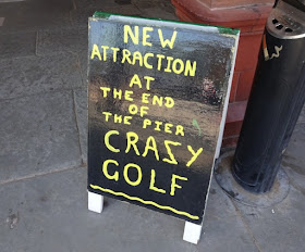 Sign for the Crazy Golf course on Saint Annes Pier