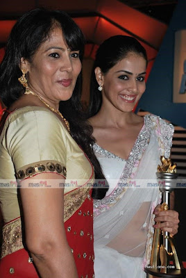 Genilia was wearing a transparent sari in this award.