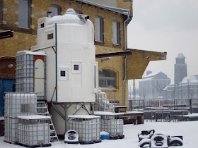 03-In-the-Snow-Jan-Körbes-REFUNC-Recycled-Silo-Tiny-Home-Architecture-www-designstack-co