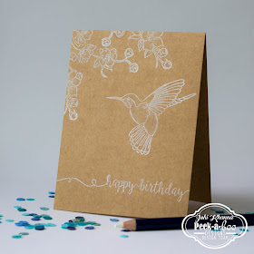 Peek-a-boo designs Humming Bird stamped in white on Kraft Cardstock